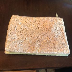 Tan embroidered clutch